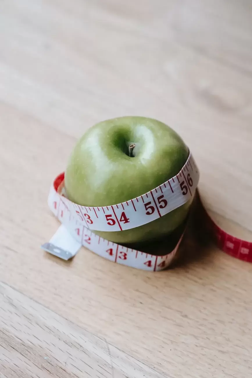 Evanston fitness nutrition tips featuring green apple with measuring tape on wooden table